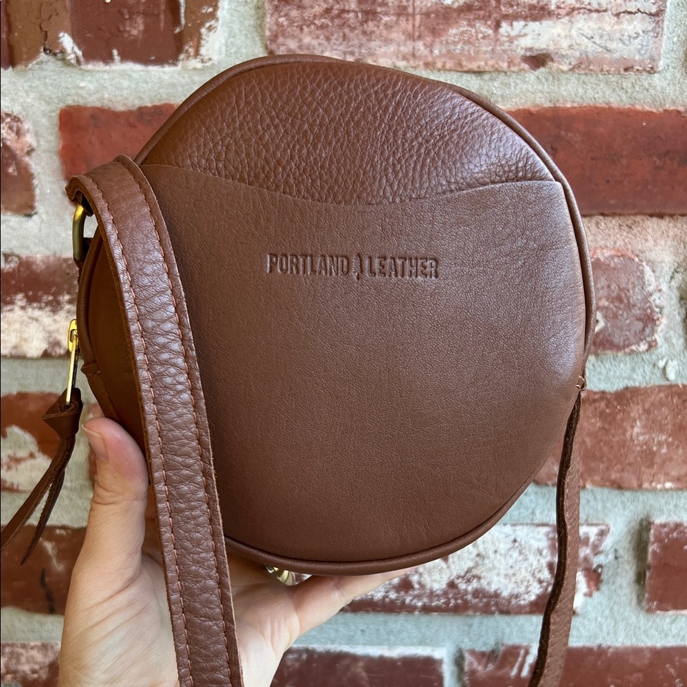 Portland Leather Goods Small Circle Crossbody Bag in Mondelo Brandy Color